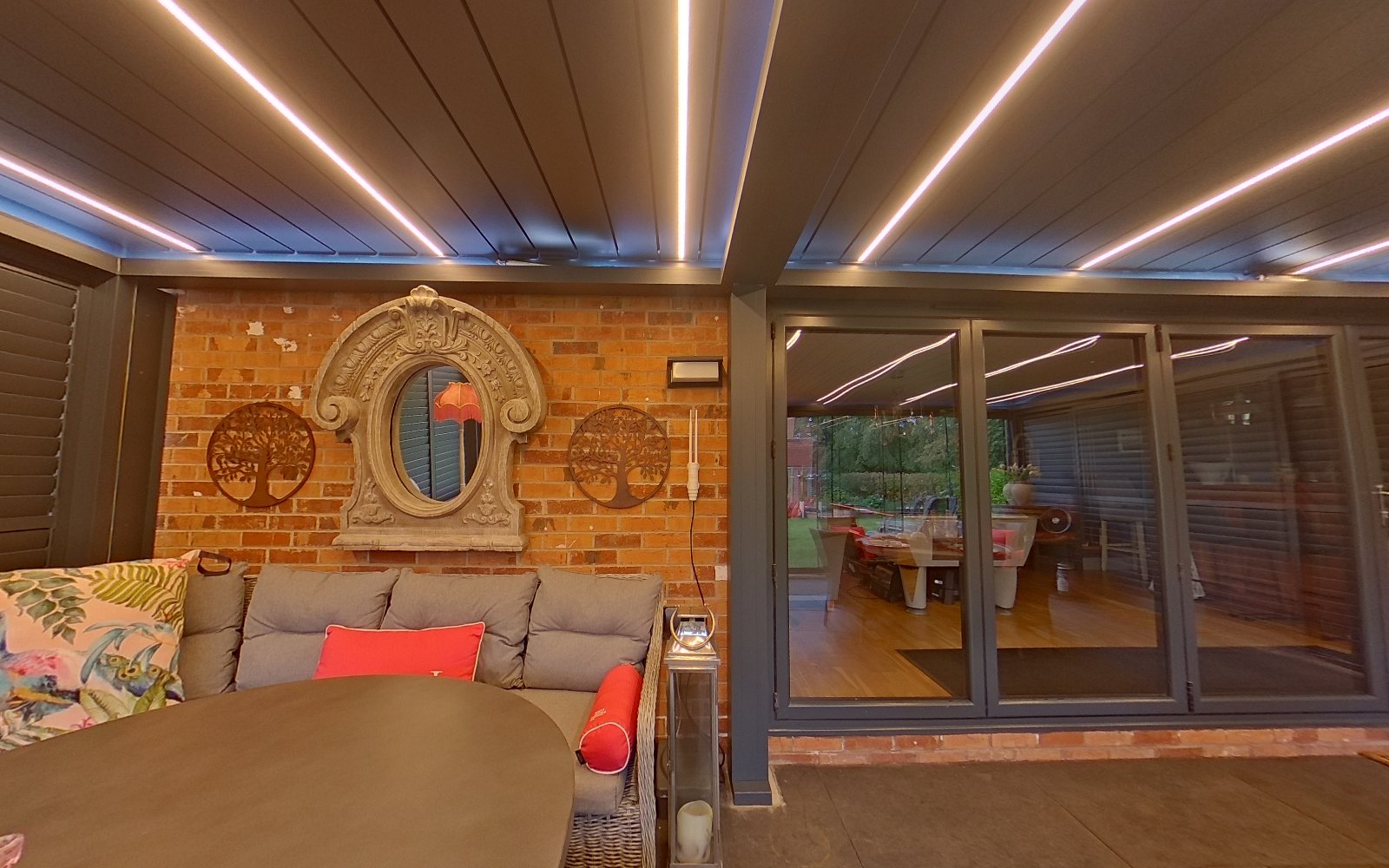 The show pergola at dusk with its LED strips on